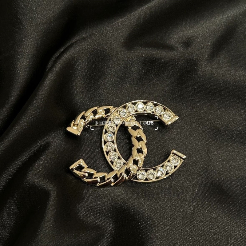 Ch*el brooches